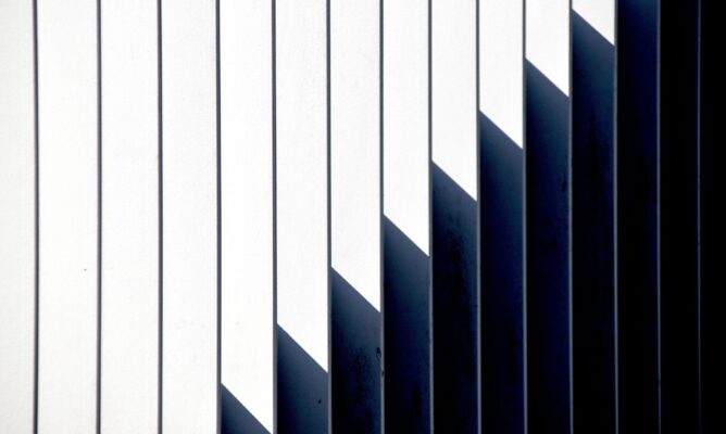 white-wall-with-shadow-lines-abstract-pattern